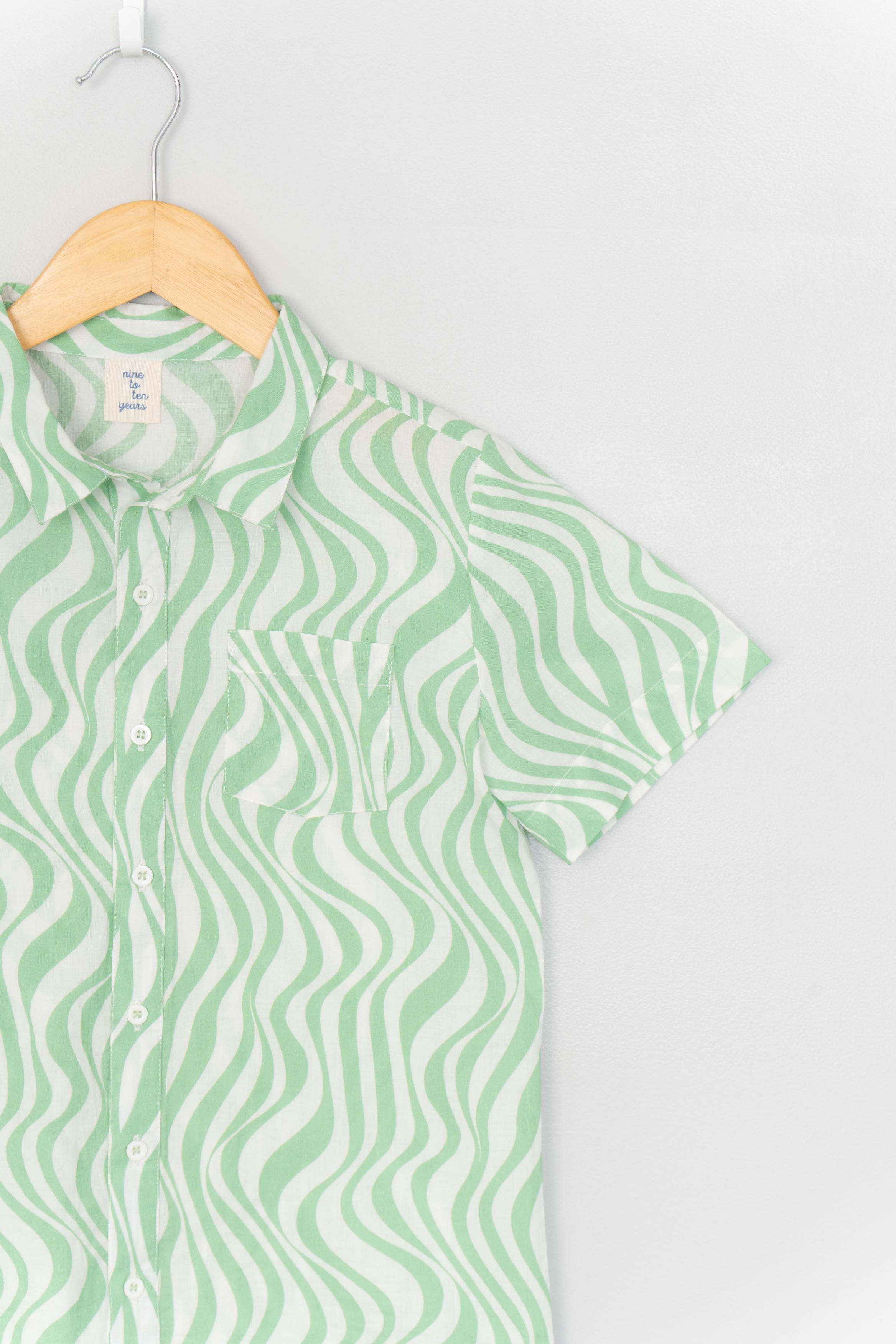 Waves in Green Shirt