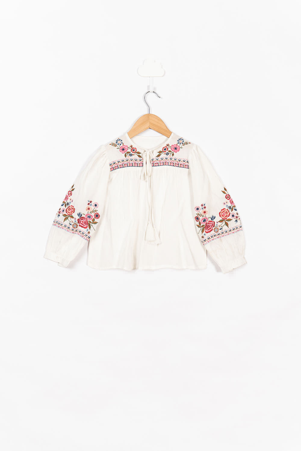 Embroidery & Tassel
 Detail Blouse