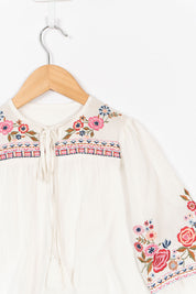 Embroidery & Tassel
 Detail Blouse